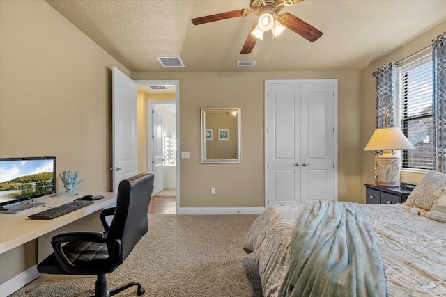 8358 Dunham Station Dr, Tampa, FL 33647 - bedroom featuring carpet flooring, a closet, a desk, and a ceiling fan