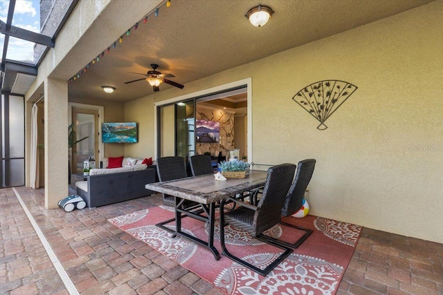 8358 Dunham Station Dr, Tampa, FL 33647 - view of patio / terrace featuring ceiling fan, an outdoor hangout area, and outdoor dining area