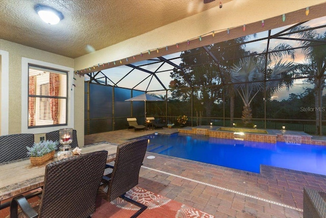 8358 Dunham Station Dr, Tampa, FL 33647 - outdoor pool featuring a patio and a lanai