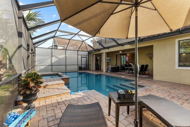 8358 Dunham Station Dr, Tampa, FL 33647 - view of pool with a patio area, glass enclosure, and a pool with connected hot tub
