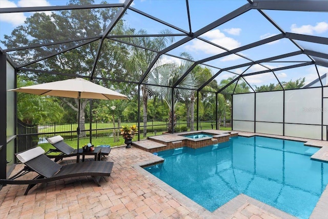8358 Dunham Station Dr, Tampa, FL 33647 - view of pool featuring a pool with connected hot tub, a patio, and glass enclosure