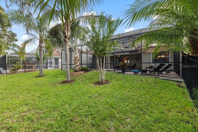 8358 Dunham Station Dr, Tampa, FL 33647 - view of yard with a lanai