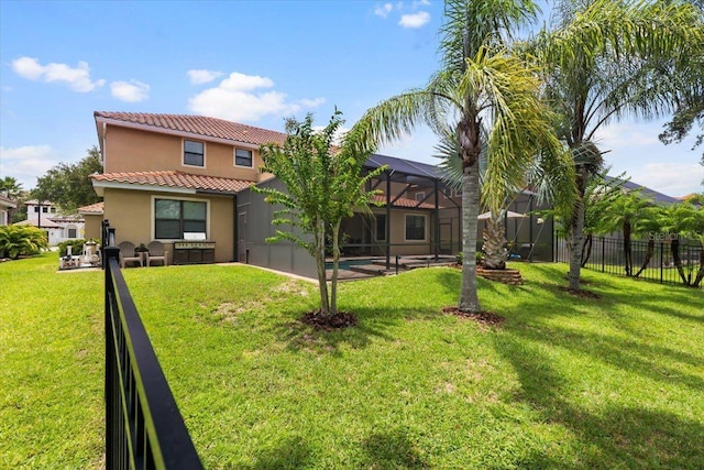8358 Dunham Station Dr, Tampa, FL 33647 - back of property featuring a tile roof, stucco siding, a lanai, and a patio