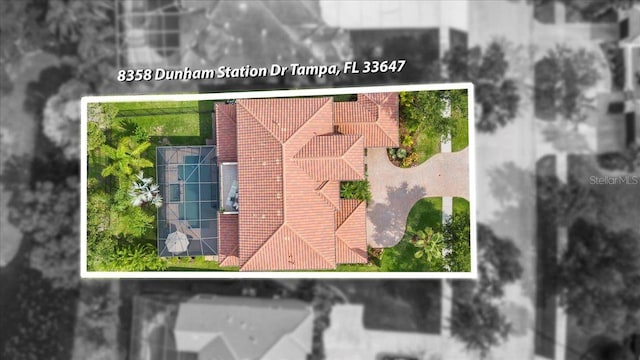 8358 Dunham Station Dr, Tampa, FL 33647 - view from above of property featuring property parcel outlined
