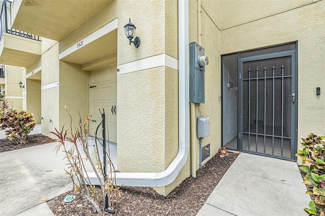 5521 Yellowfin Ct, New Port Richey, FL 34652 - property entrance featuring stucco siding
