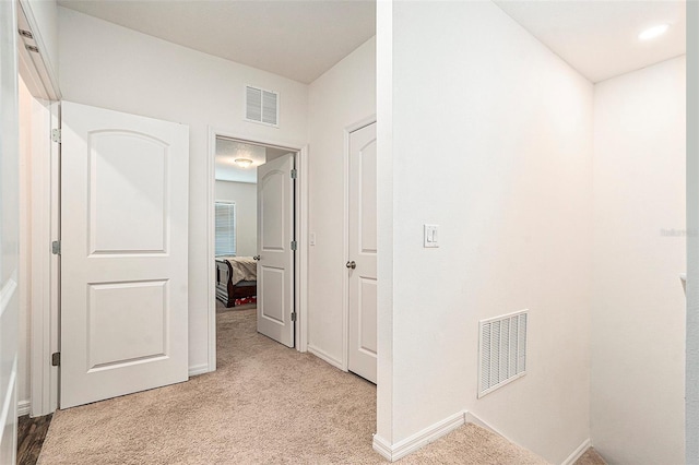 5521 Yellowfin Ct, New Port Richey, FL 34652 - hallway featuring light colored carpet