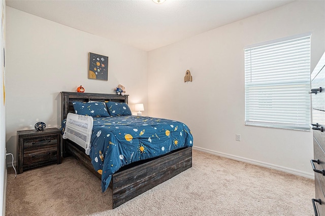 5521 Yellowfin Ct, New Port Richey, FL 34652 - carpeted bedroom with baseboards