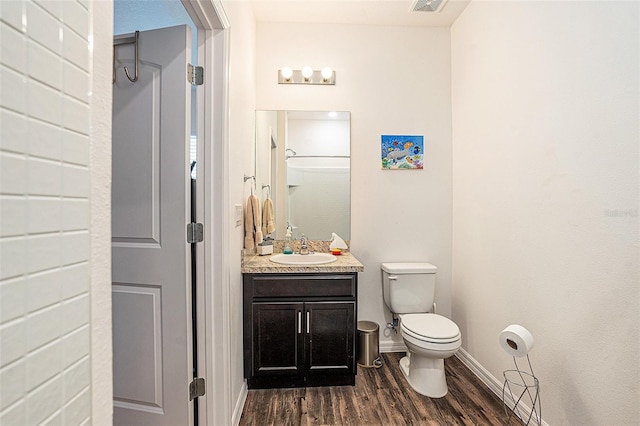 5521 Yellowfin Ct, New Port Richey, FL 34652 - bathroom featuring wood finished floors and vanity