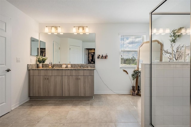 7517 Notched Pine Bnd, Wesley Chapel, FL 33545 - bathroom featuring vanity and baseboards