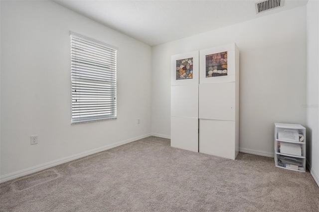 7517 Notched Pine Bnd, Wesley Chapel, FL 33545 - unfurnished bedroom with carpet and baseboards