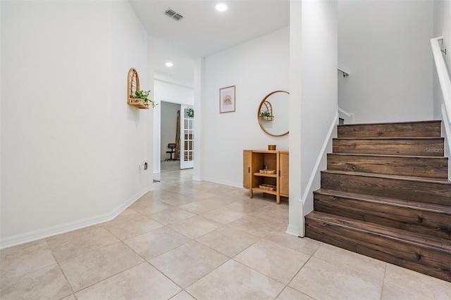 7517 Notched Pine Bnd, Wesley Chapel, FL 33545 - stairs featuring tile patterned flooring and recessed lighting