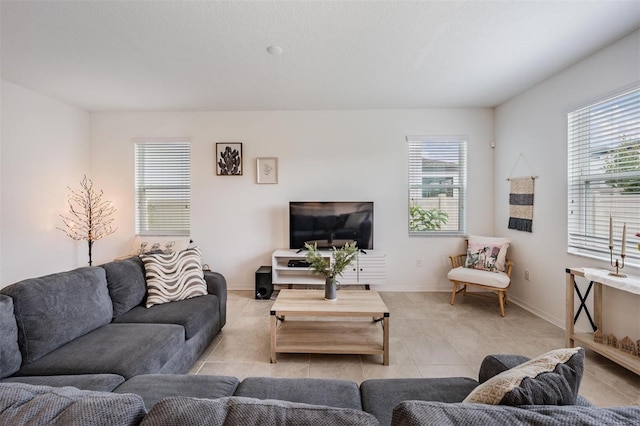 7517 Notched Pine Bnd, Wesley Chapel, FL 33545 - living room featuring plenty of natural light and tile patterned floors