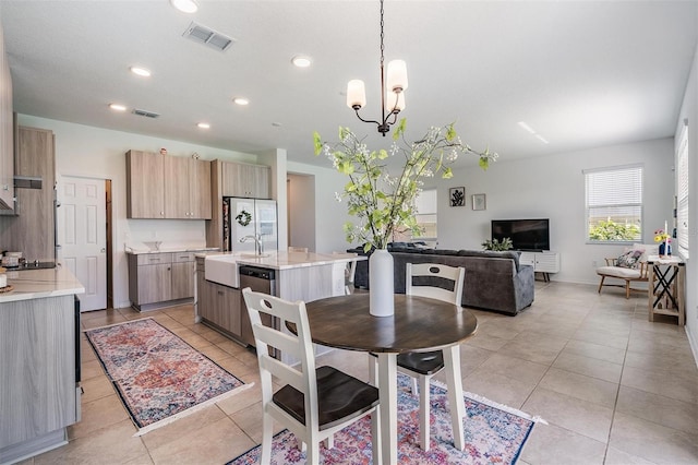 7517 Notched Pine Bnd, Wesley Chapel, FL 33545 - dining space featuring recessed lighting, light tile patterned floors, and a chandelier