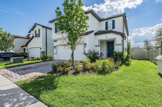 7517 Notched Pine Bnd, Wesley Chapel, FL 33545 - traditional-style home with a garage, decorative driveway, and stucco siding