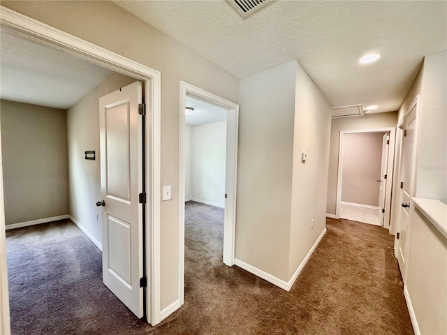 2612 E 26th Ave, Tampa, FL 33605 - hall featuring dark carpet and attic access