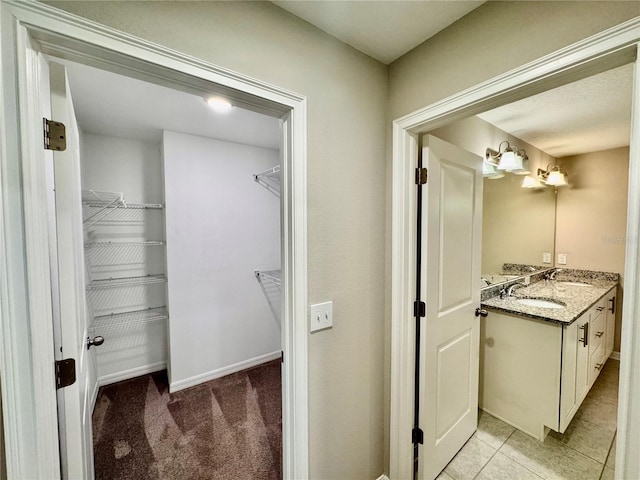 2612 E 26th Ave, Tampa, FL 33605 - full bathroom featuring vanity and a walk in closet
