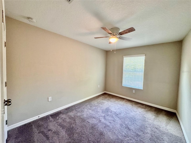 2612 E 26th Ave, Tampa, FL 33605 - carpeted spare room with a smoke detector, ceiling fan, and a textured ceiling