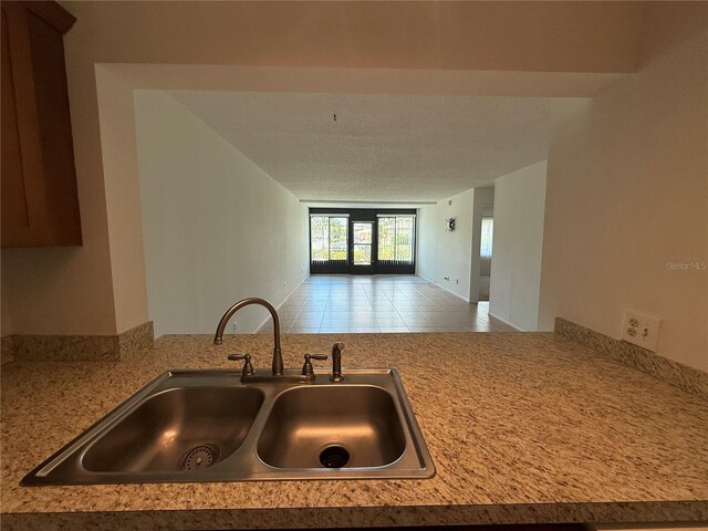 12300 Vonn Rd Unit 9105, Largo, FL 33774 - kitchen with light countertops, tile patterned floors, and open floor plan