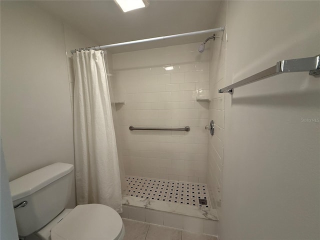 12300 Vonn Rd Unit 9105, Largo, FL 33774 - bathroom featuring toilet and tiled shower