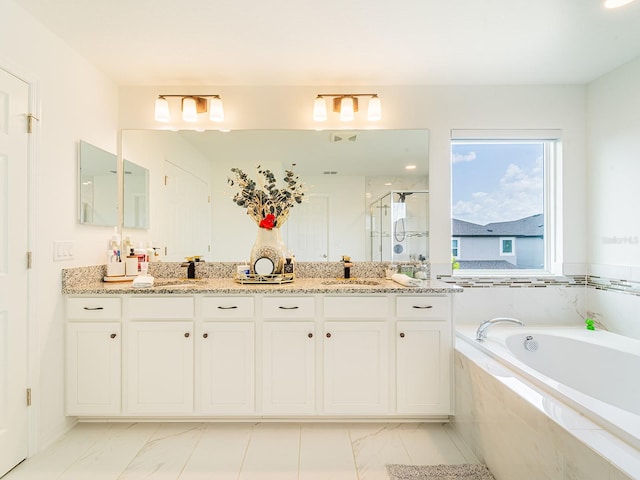 7700 Bronze Oak Dr, Wesley Chapel, FL 33545 - full bath featuring double vanity, a stall shower, a bath, and marble look tile flooring