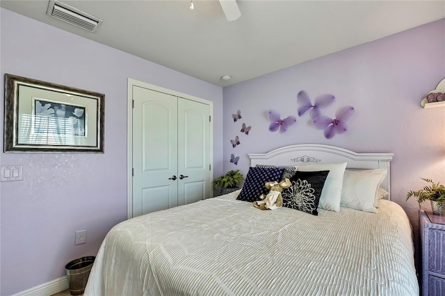 12411 Talpa St, Spring Hill, FL 34608 - bedroom featuring a closet and a ceiling fan