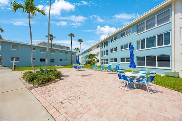 6161 Gulf Winds Dr Unit 347, St Pete Beach, FL 33706 - view of home's community featuring a patio area and outdoor dining space