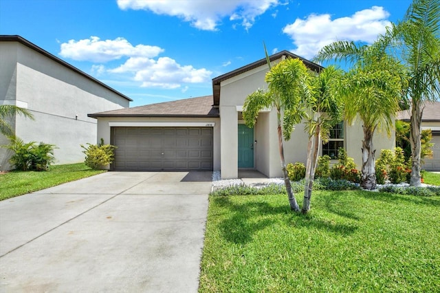 12838 Wildflower Meadow Dr, Riverview, FL 33579 - view of front facade with stucco siding, a garage, driveway, and a front lawn