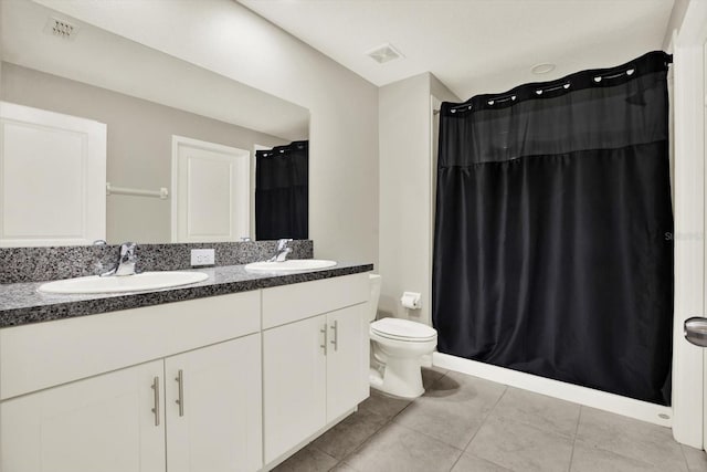 12838 Wildflower Meadow Dr, Riverview, FL 33579 - bathroom featuring double vanity, tile patterned flooring, and a shower with shower curtain