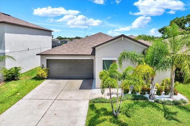 12838 Wildflower Meadow Dr, Riverview, FL 33579 - view of front of property with an attached garage, driveway, stucco siding, a shingled roof, and a front yard