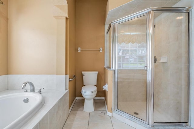 5283 Bevens Ave, Spring Hill, FL 34608 - bathroom featuring a garden tub, a shower stall, and tile patterned floors
