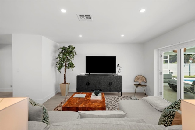 5884 51st St S, Saint Petersburg, FL 33715 - living area with recessed lighting and light wood finished floors