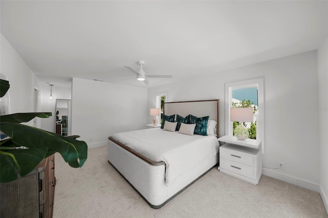 5884 51st St S, Saint Petersburg, FL 33715 - bedroom featuring light carpet and a ceiling fan