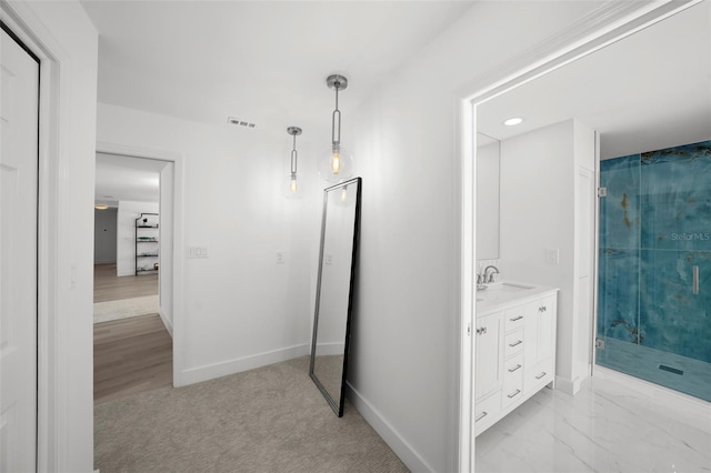 5884 51st St S, Saint Petersburg, FL 33715 - hallway featuring baseboards and recessed lighting
