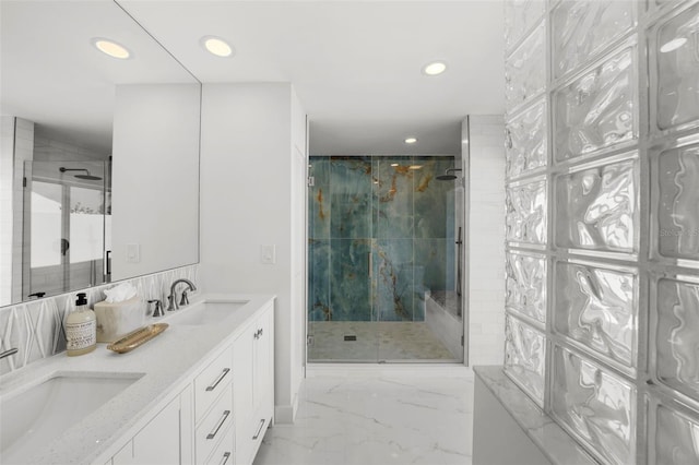 5884 51st St S, Saint Petersburg, FL 33715 - full bath with recessed lighting, a stall shower, double vanity, and marble tiled floors