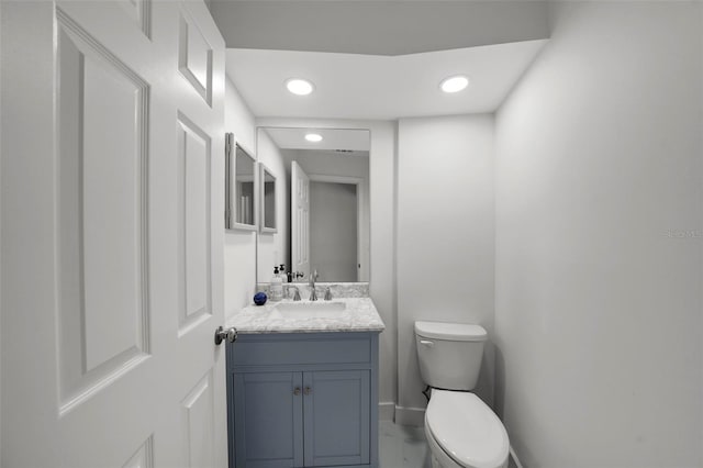 5884 51st St S, Saint Petersburg, FL 33715 - half bathroom featuring vanity and recessed lighting