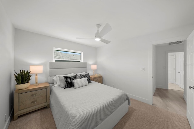 5884 51st St S, Saint Petersburg, FL 33715 - carpeted bedroom featuring baseboards and ceiling fan