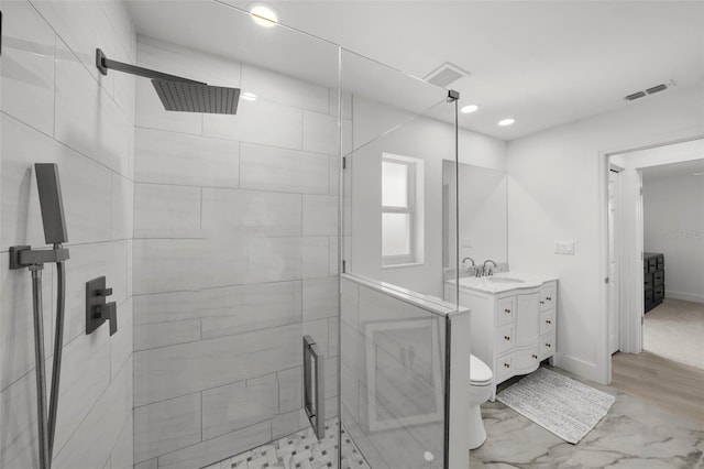 5884 51st St S, Saint Petersburg, FL 33715 - bathroom with a stall shower, vanity, recessed lighting, and marble look tiles