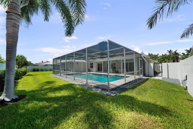 5884 51st St S, Saint Petersburg, FL 33715 - view of pool featuring a fenced backyard, a patio, and glass enclosure