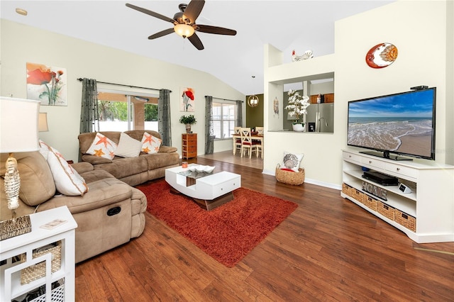 12337 Rose Haven Blvd, New Port Richey, FL 34654 - living area featuring wood finished floors, a ceiling fan, and vaulted ceiling