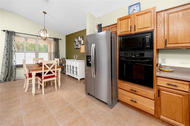 12337 Rose Haven Blvd, New Port Richey, FL 34654 - kitchen featuring black appliances, lofted ceiling, a chandelier, light tile patterned floors, and light countertops