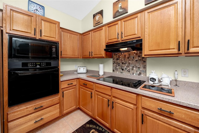 12337 Rose Haven Blvd, New Port Richey, FL 34654 - kitchen featuring black appliances, ventilation hood, light countertops, light tile patterned flooring, and decorative backsplash