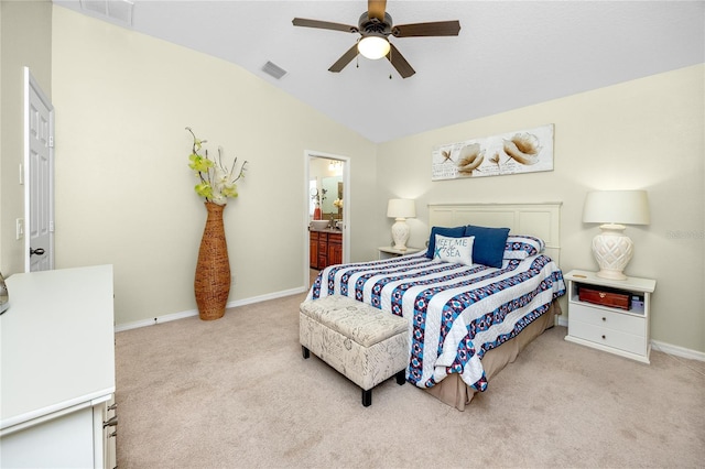 12337 Rose Haven Blvd, New Port Richey, FL 34654 - carpeted bedroom with vaulted ceiling, ceiling fan, and ensuite bath