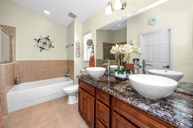 12337 Rose Haven Blvd, New Port Richey, FL 34654 - full bathroom featuring a bath, double vanity, tile patterned flooring, and a tile shower