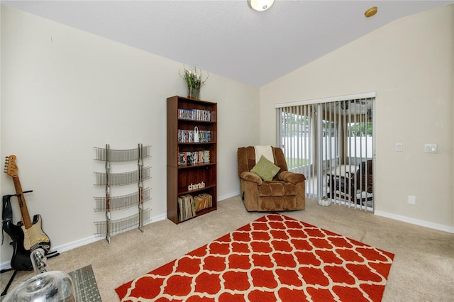 12337 Rose Haven Blvd, New Port Richey, FL 34654 - sitting room with carpet and vaulted ceiling