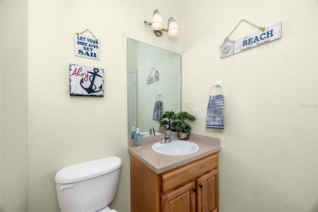 12337 Rose Haven Blvd, New Port Richey, FL 34654 - bathroom with toilet and vanity