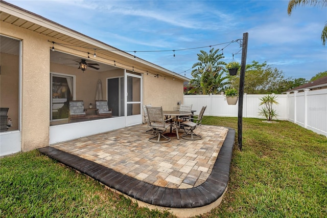 12337 Rose Haven Blvd, New Port Richey, FL 34654 - fenced backyard featuring a patio area and outdoor dining area