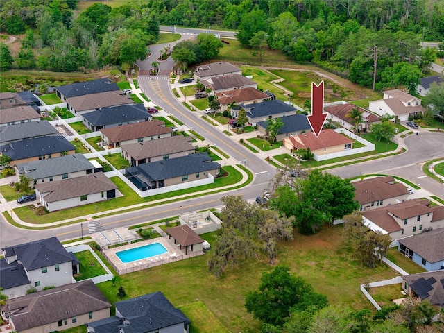 12337 Rose Haven Blvd, New Port Richey, FL 34654 - aerial view of property and surrounding area with nearby suburban area