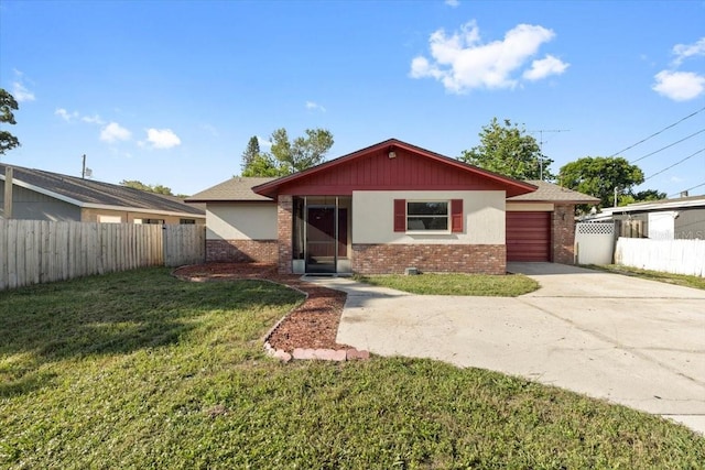 2233 Curlew Rd, Dunedin, FL 34698 - ranch-style house featuring brick siding, driveway, and a garage
