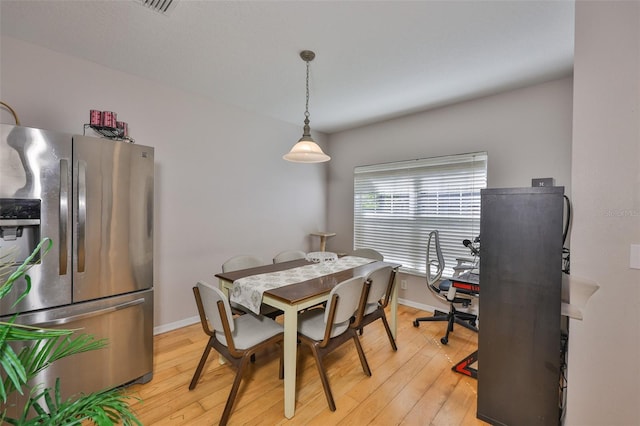 5717 Fishhawk Ridge Dr, Lithia, FL 33547 - dining area with light wood-style flooring