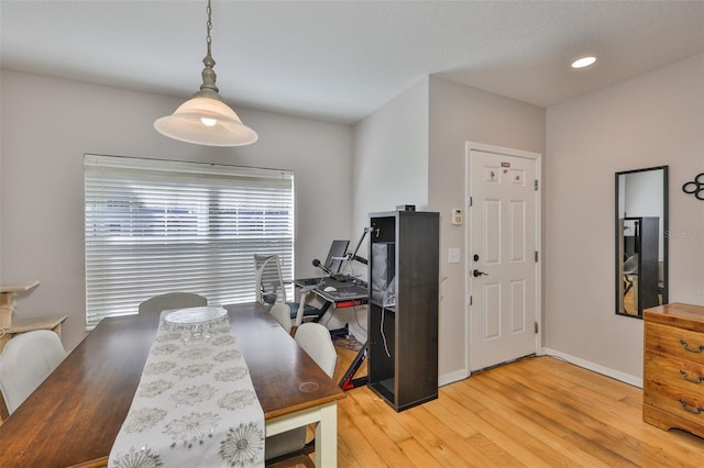 5717 Fishhawk Ridge Dr, Lithia, FL 33547 - dining space with light wood finished floors, recessed lighting, and a desk